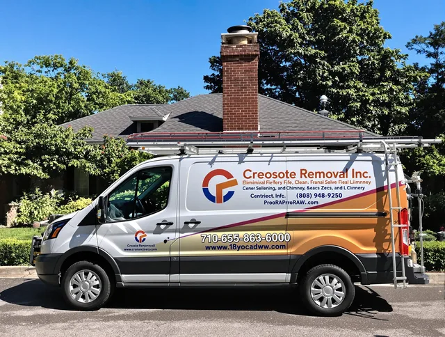 West Hartford Chimney Sweep technician removing creosote safely in West Hartford, CT